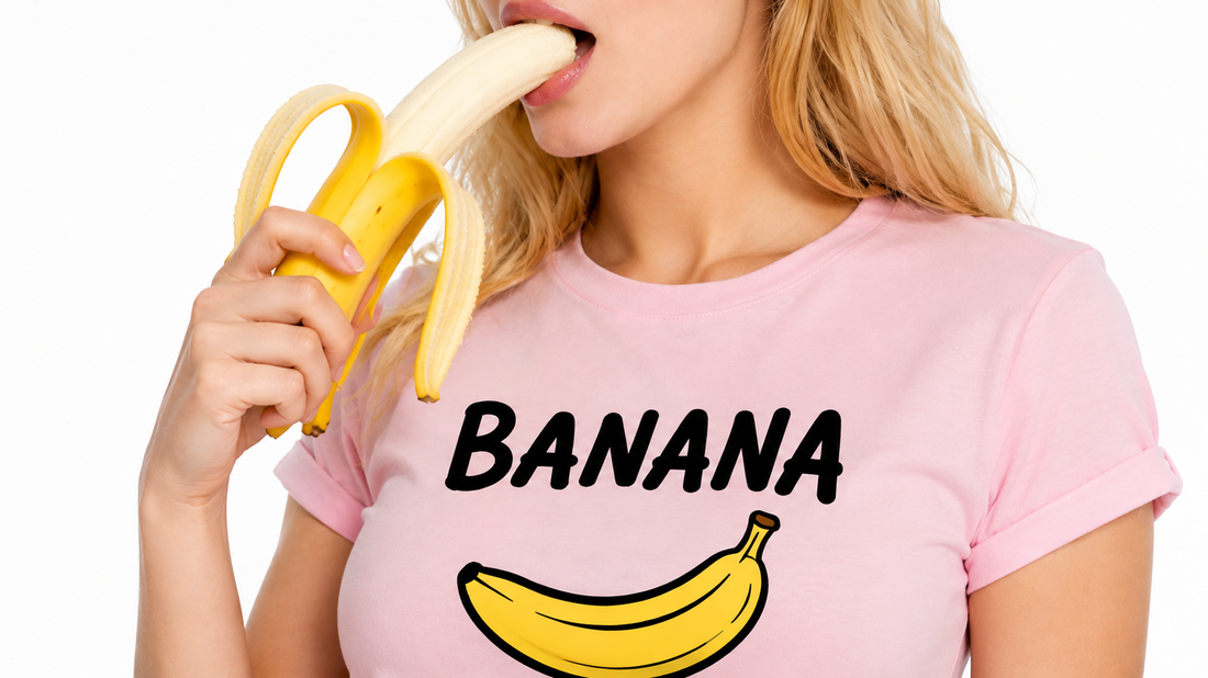 A girl is eating a banana.