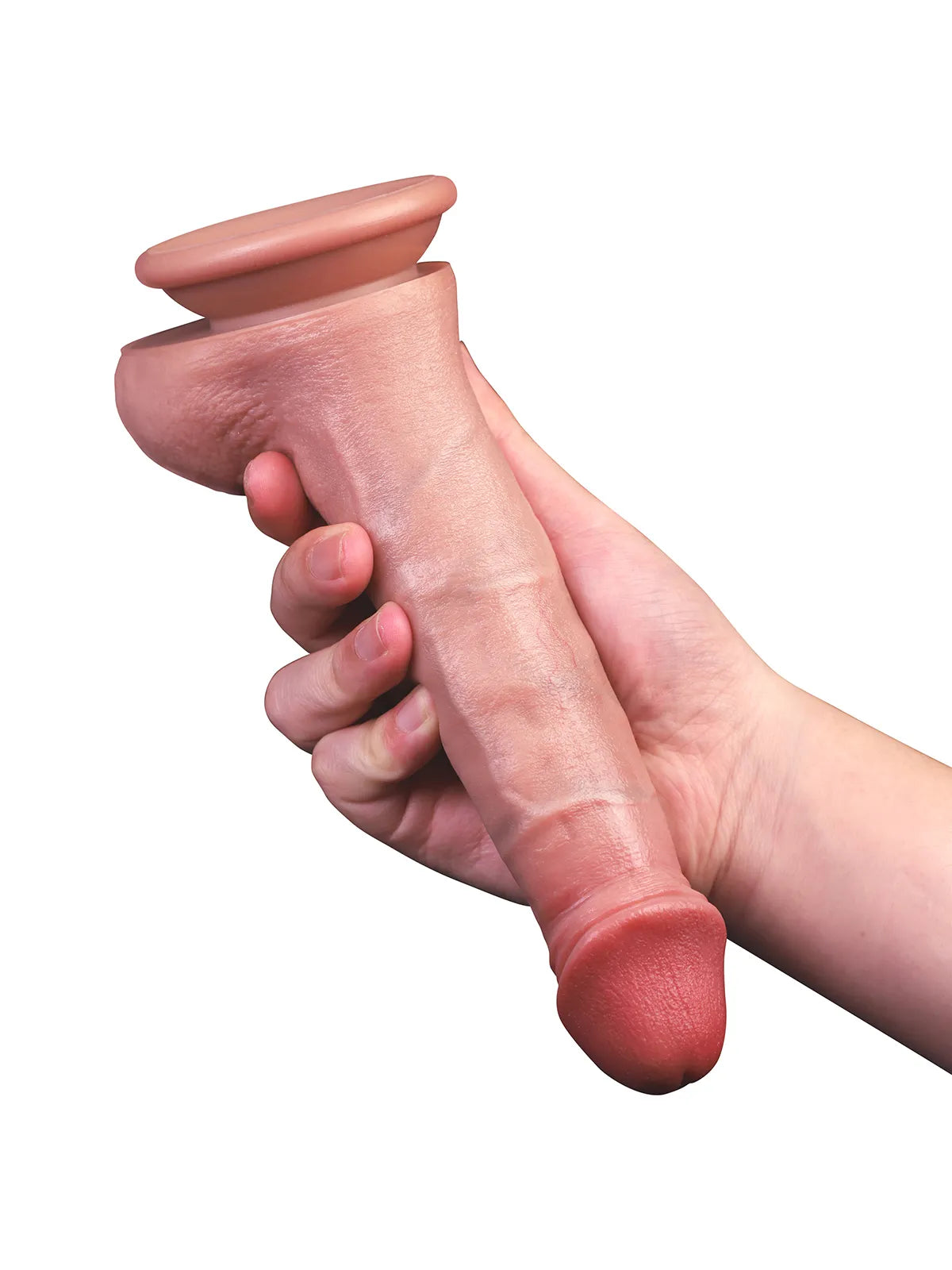 Hand holding Jessie realistic dildo from the back