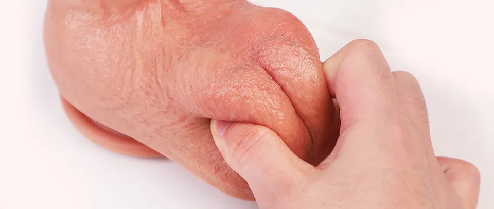 Close-up of Jason balls being pressed by hand