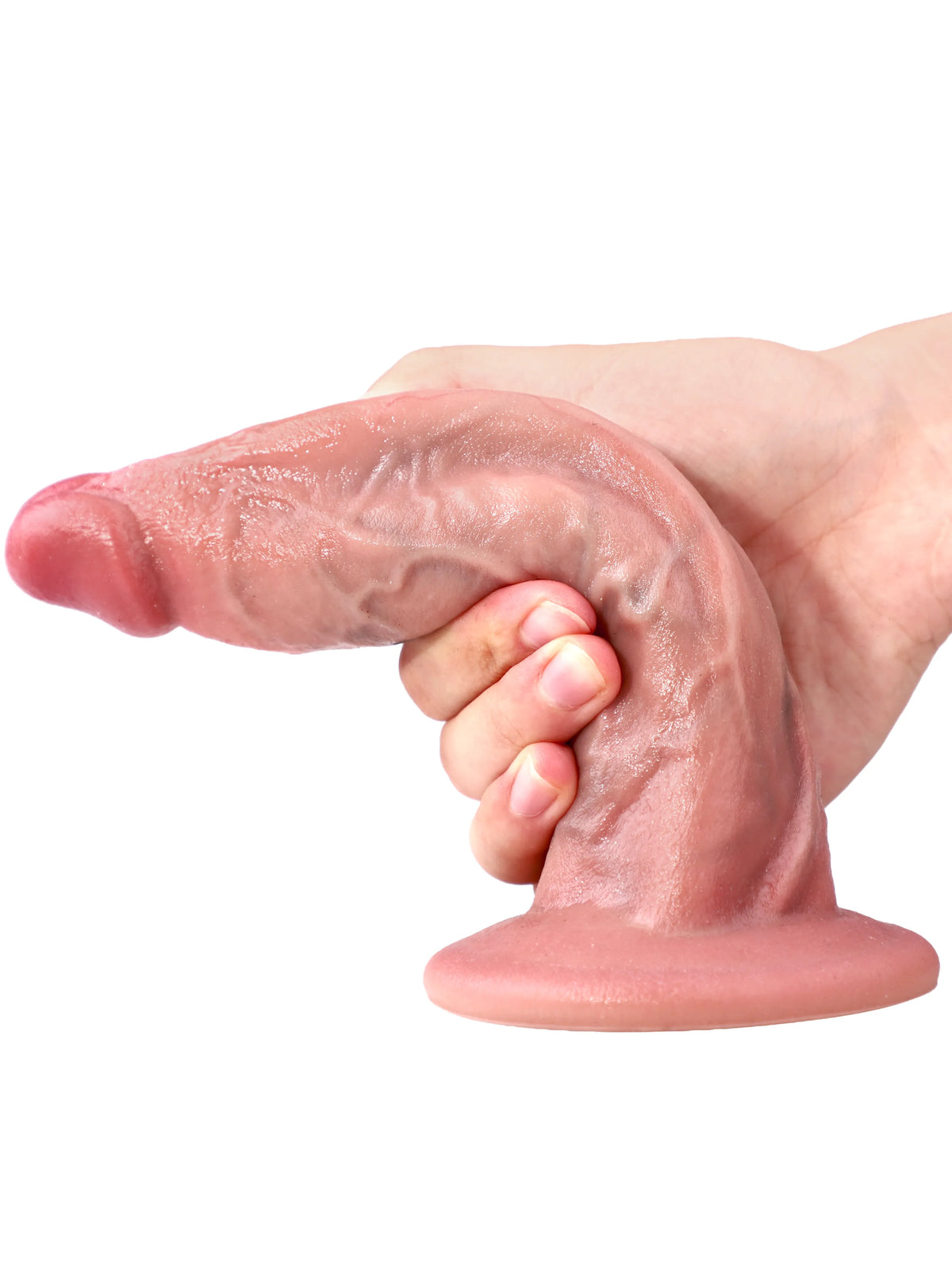 Don realistic dildo bent horizontally by hand to demonstrate flexibility.