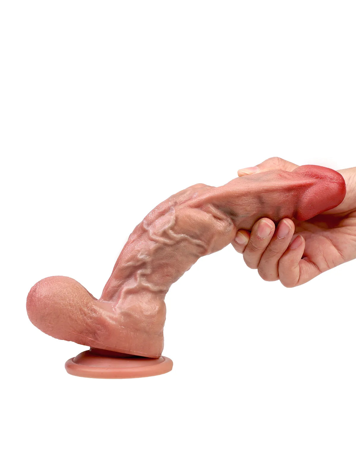 Hand bending the flexible Coach dildo